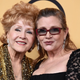 Debbie Reynolds and Carrie Fisher at the 21st annual Screen Actors Guild Awards, Jan. 25, 2015. Image: Jordan Strauss/Invision/AP